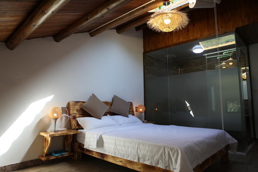 Moganshan Pinhouwu Hotel Deqing Zimmer foto